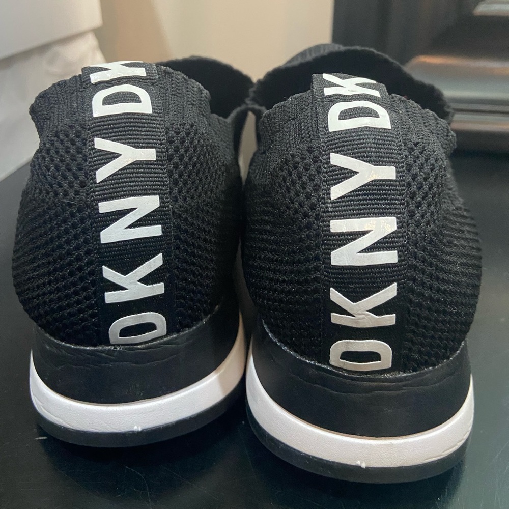 Black and white barley worn slide in sneakers